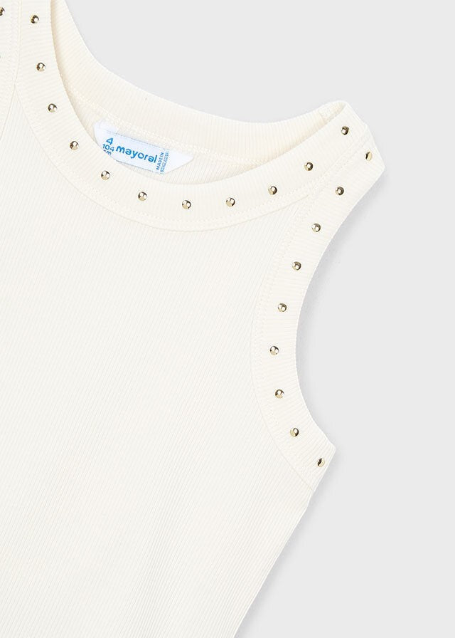 Canotta bambina Scugnizzi 0-16 in cotone bianco panna con borchie dorate decorative su scollatura e giromanica.