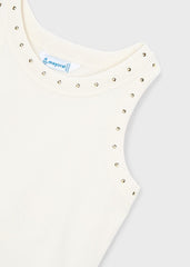 Canotta bambina Scugnizzi 0-16 in cotone bianco panna con borchie dorate decorative su scollatura e giromanica.