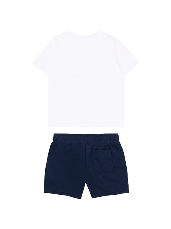 Completo Scugnizzi 0-16 New Balance con t-shirt bianca e pantaloncini blu navy, vista posteriore