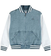 Giacca bomber Scugnizzi 0-16 in denim blu slavato con maniche bianche in tessuto, colletto e orlo a righe.