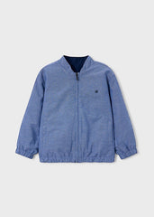 Giacca bomber reversibile blu Scugnizzi 0-16 con chiusura a zip, polsini elasticizzati e design versatile per bambini.