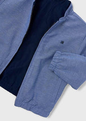 Giacca bomber reversibile Scugnizzi 0-16 blu con zip, polsini elasticizzati e design versatile per bambini.