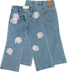 Pantaloni in denim azzurro Scugnizzi 0-16 con applicazioni floreali in tessuto rosa e tasche frontali