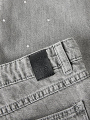 Jeans a gamba larga Scugnizzi 0-16 in denim grigio chiaro con strass decorativi e etichetta posteriore in pelle
