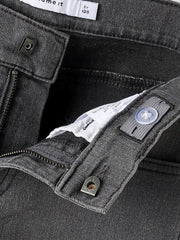 Dettaglio della vita regolabile e chiusura con zip di pantaloni in denim grigio Scugnizzi 0-16 per bambini