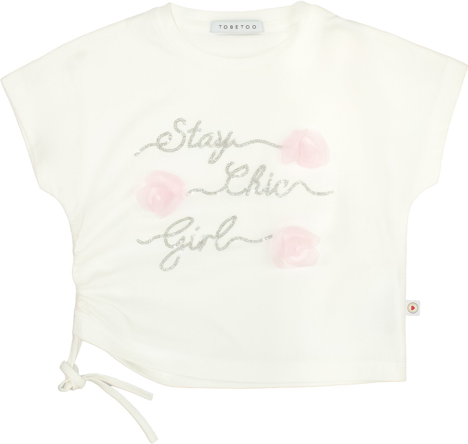 Maglietta Scugnizzi 0-16 bianca con scritta glitter argento Stay Chic Girl e applicazioni floreali rosa con laccetto laterale