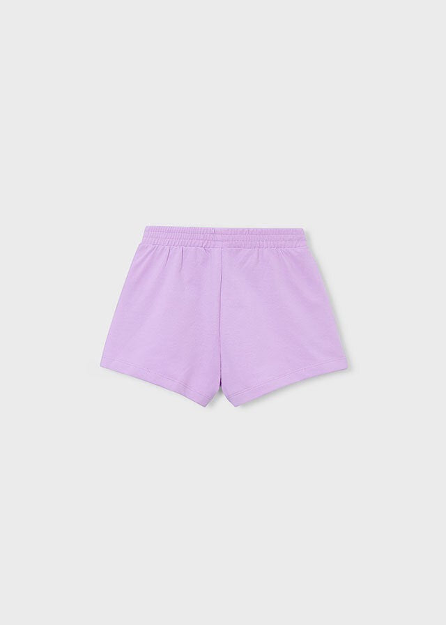 Pantaloncini sportivi Scugnizzi 0-16 per bambina in cotone lilla con vita elasticizzata, vista posteriore.