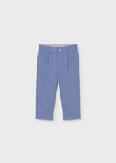 Pantaloni eleganti blu in misto lino per bambino Scugnizzi 0-16, con vita elasticizzata e pieghe frontali.