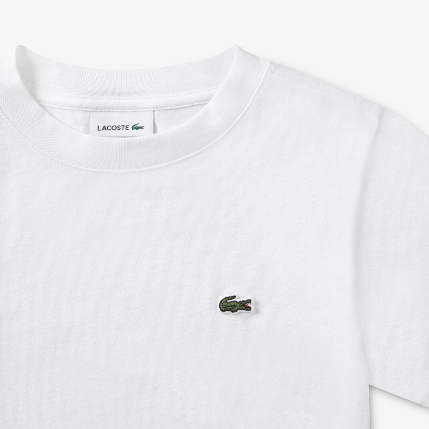 T-shirt bianca in cotone Scugnizzi 0-16 con iconico logo coccodrillo Lacoste ricamato sul petto