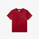T-shirt rossa in jersey di cotone Lacoste per bambini con logo coccodrillo ricamato, proposta da Scugnizzi 0-16