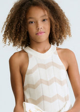 Abito lungo senza maniche Scugnizzi 0-16 in maglia a zig-zag bianco e beige, con collo alto.