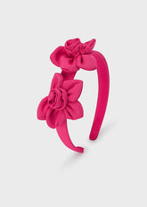 Cerchietto fucsia Scugnizzi 0-16 con due fiori decorativi in tessuto, accessorio capelli per bambina.