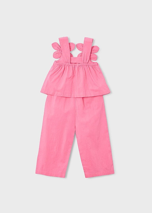 Scugnizzi 0-16 completo rosa acceso con pantalone corto, top con spalline floreali tridimensionali e vita elasticizzata.