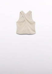 Scugnizzi 0-16 gilet senza maniche color champagne in tessuto metallizzato con scollo americano incrociato e dettaglio drappeggiato.