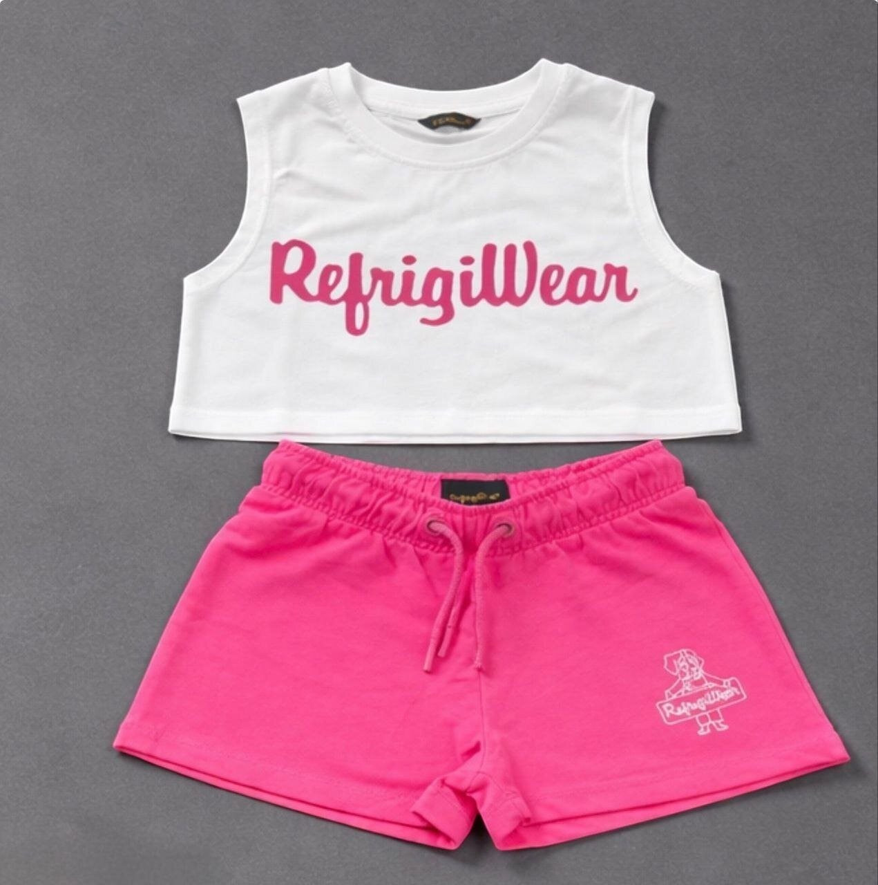 Completo due pezzi Scugnizzi 0-16 RefrigiWear con canotta bianca e pantaloncini fucsia con coulisse