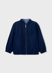 Giacca bomber reversibile blu Scugnizzi 0-16 con chiusura a zip, polsini e fondo elasticizzati per bambini.