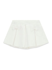 Gonna a pieghe bianca Scugnizzi 0-16 per bambina con delicati fiocchi decorativi sul davanti