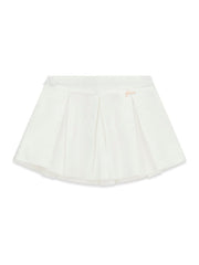 Gonna a pieghe bianca Scugnizzi 0-16 per bambina con dettaglio logo dorato, elegante e versatile.