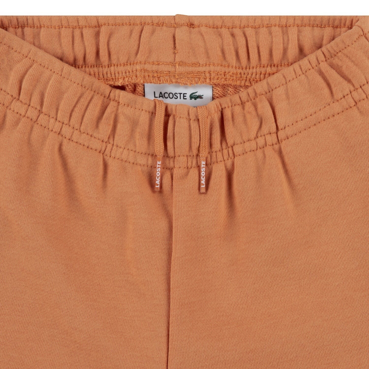 Dettaglio vita elastica con coulisse di pantaloncini color cuoio Scugnizzi 0-16 in cotone con logo Lacoste