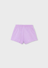 Pantaloncini sportivi Scugnizzi 0-16 per bambina in cotone lilla con vita elasticizzata, vista posteriore.