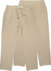 Pantaloni casual beige Scugnizzi 0-16 in tessuto leggero con vita elasticizzata, coulisse regolabile e tasche funzionali.
