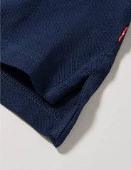 Dettaglio dello spacco laterale su polo blu navy in cotone piqué per bambino firmata Scugnizzi 0-16
