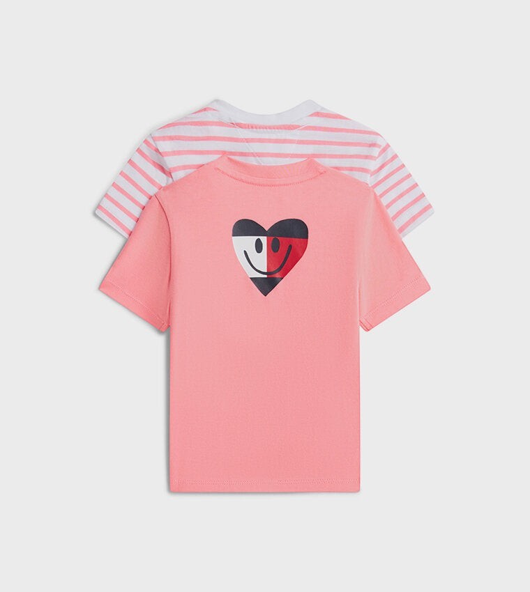 Set di due magliette Scugnizzi 0-16 Tommy Hilfiger in cotone, una rosa con cuore e una a righe bianche e rosa.