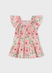Abito corto Scugnizzi 0-16 beige con stampa floreale rosa e maniche a sbuffo. Tessuto leggero, corpetto arricciato elasticizzato.