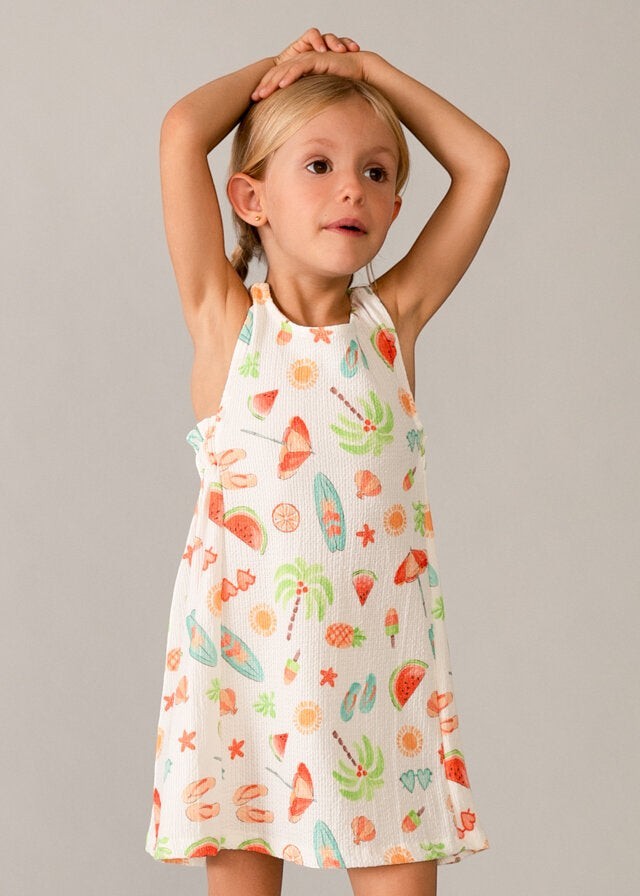 Scugnizzi 0-16 bambina abito estivo bianco con stampa tropicale di palme, ananas e angurie. Tessuto leggero e traspirante.
