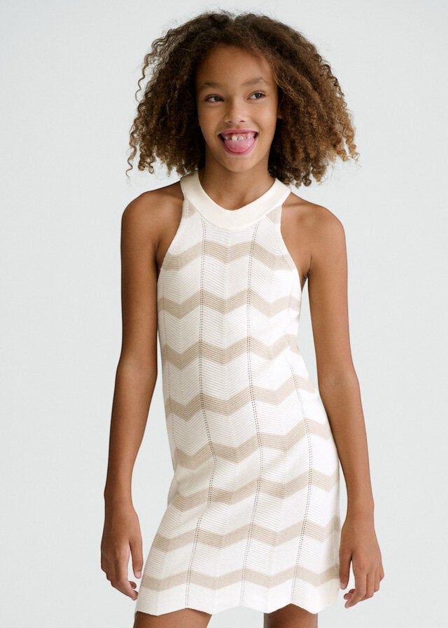 Abito lungo senza maniche Scugnizzi 0-16 in maglia a zig-zag bianca e beige, con collo alto.