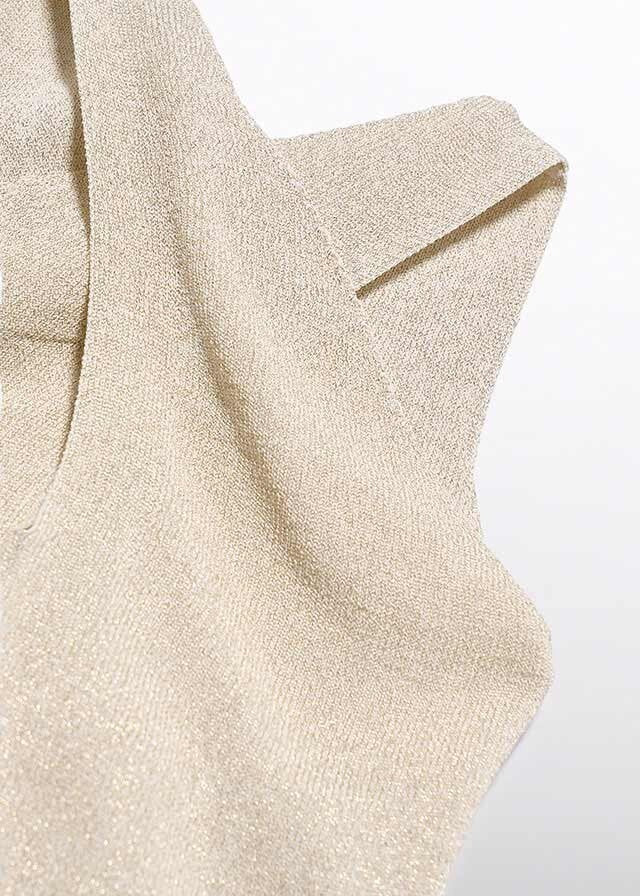 Scugnizzi 0-16 gilet color champagne in tessuto metallizzato con scollo americano e design senza maniche.