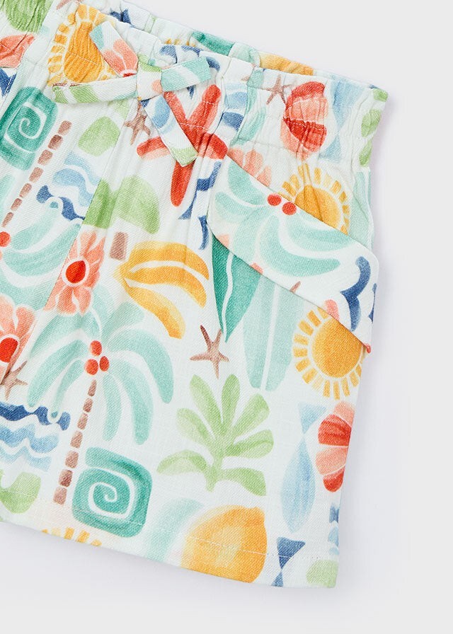 Scugnizzi 0-16 shorts da bambina con stampa tropicale multicolore, vita elasticizzata e tasche laterali.