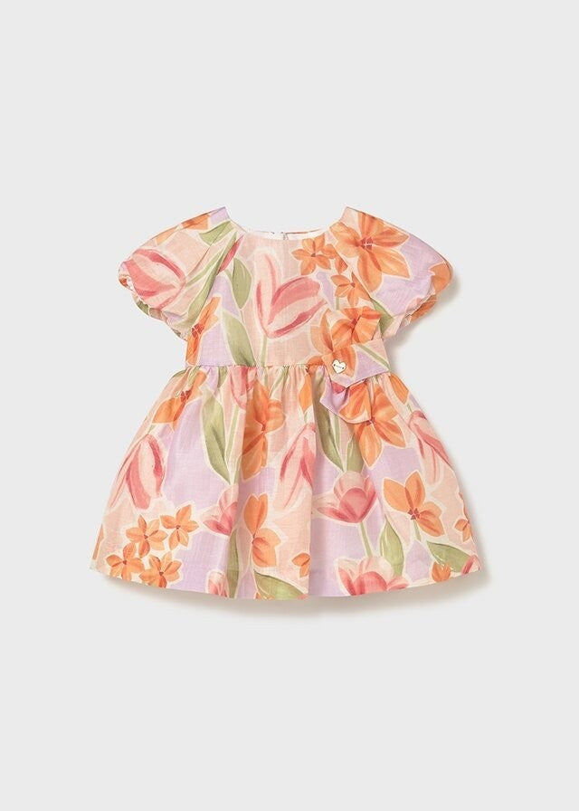 Abito estivo Scugnizzi 0-16 con stampa floreale arancione, rosa e lilla, maniche a sbuffo e fiocco decorativo.
